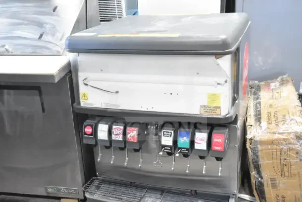 Cornelius DF200-BC 8 flavor countertop soda machine, 115V, 1 phase, with drink labels, in used condition.