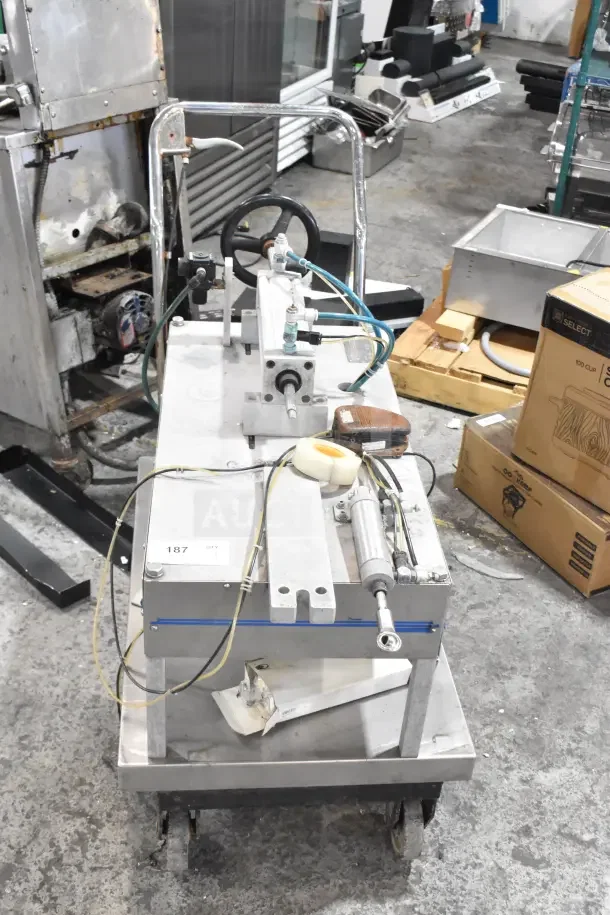 Geyer Portable System on commercial casters with metal frame; features visible hoses and control valve.