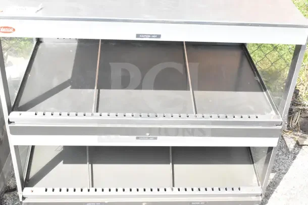 Hatco GRSDS/H-36D heated display merchandiser, 2-tier, 120 volts, with "Caution - Hot" labels, countertop use.