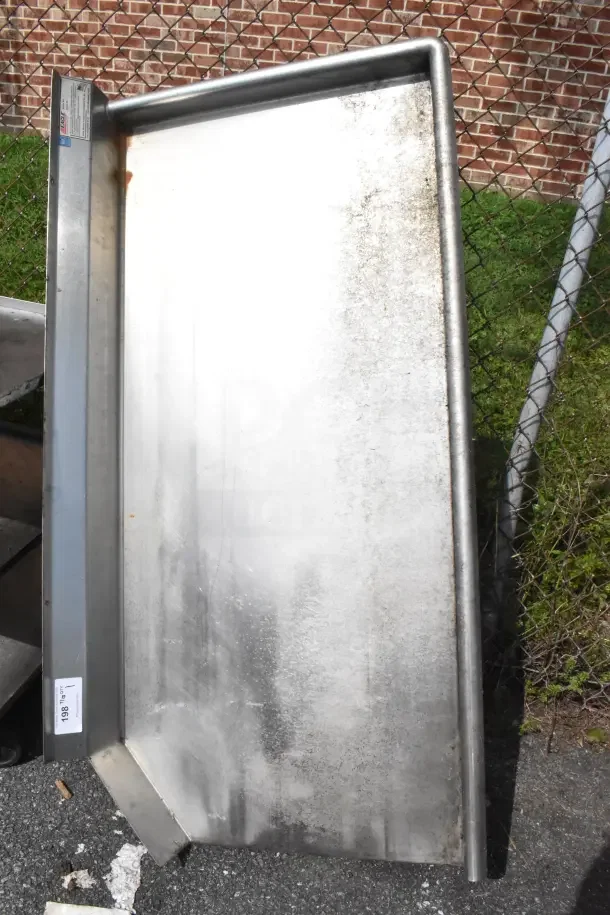 Eagle Commercial Right Side Clean Side Dishwasher Table, stainless steel, no legs, used condition, visible surface wear.
