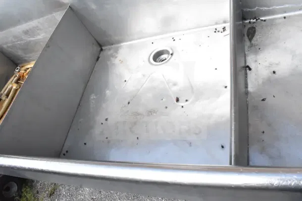 Commercial 3 Bay Sink, stainless steel, moderate wear, visible dirt and debris, designed for commercial use.