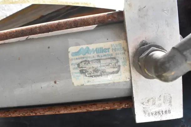 Miller W AL84B2B Pneumatic Cylinder, visible label, 4" bore, 20" stroke, model and serial number marked, used condition.