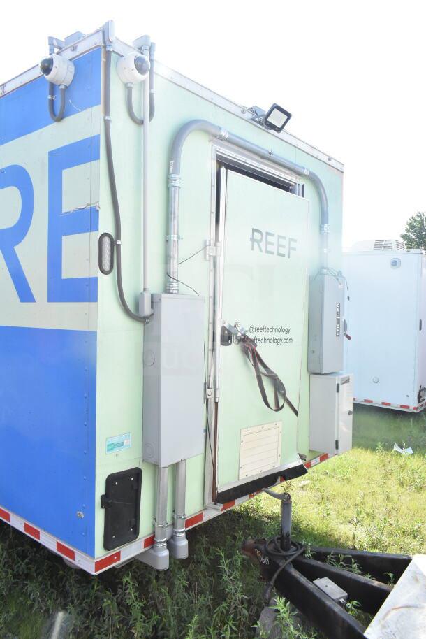 2021 Rock Solid Cargo 8.5'x24' food trailer, light green with blue accents. Features rear door labeled "REEF." Modern condition.