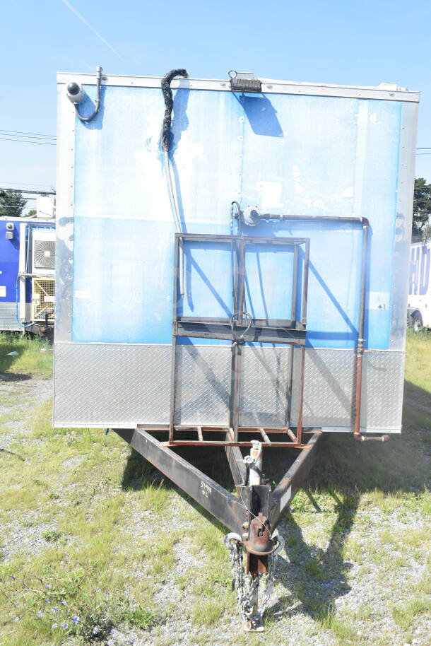 2021 Rock Solid Cargo 8.5'x24' food trailer, VIN 7H2BE2426MD037994, exterior view showing metal frame and hitch.
