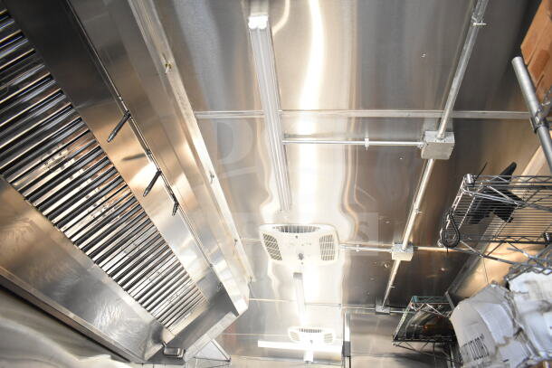 2021 Rock Solid Cargo 8.5'x24' food trailer interior, stainless steel finish, ventilation and lighting system installed.
