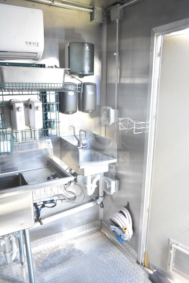 2021 Rock Solid Cargo 8.5'x24' food trailer interior with stainless steel sink, dispensers, Ventus X inverter HVAC.
