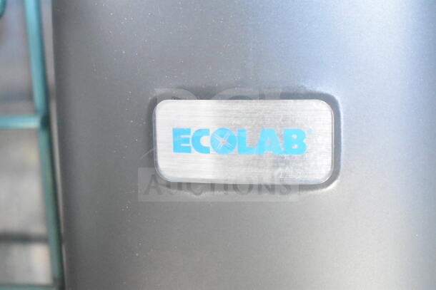 Close-up of an Ecolab label on a metallic surface of a 2021 Rock Solid Cargo food trailer.