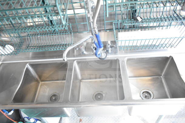 2021 Rock Solid Cargo food trailer with 3-compartment stainless steel sink, part of refrigeration suite, in excellent condition.
