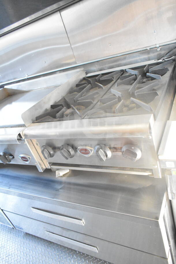 2021 Rock Solid Cargo 8.5'x24' food trailer with CaptiveAire grease hood, fire suppression, and Imperial gas fryers.