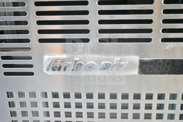 "Turbo Air" refrigeration panel on 2021 Rock Solid Cargo food trailer. Features grease hood, fire suppression, gas fryers.