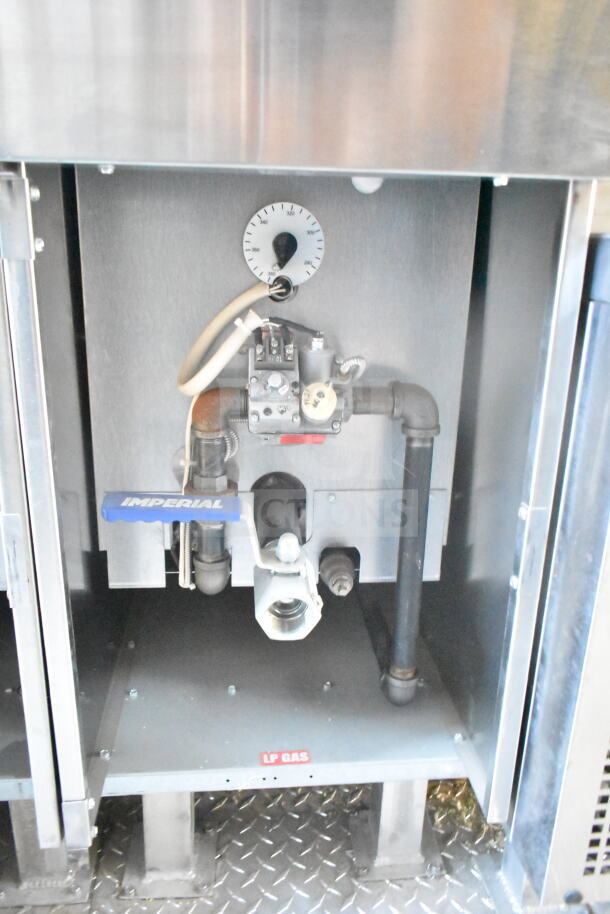 Imperial gas fryer interior with LP gas indicator in a 2021 Rock Solid Cargo 8.5'x24' food trailer.