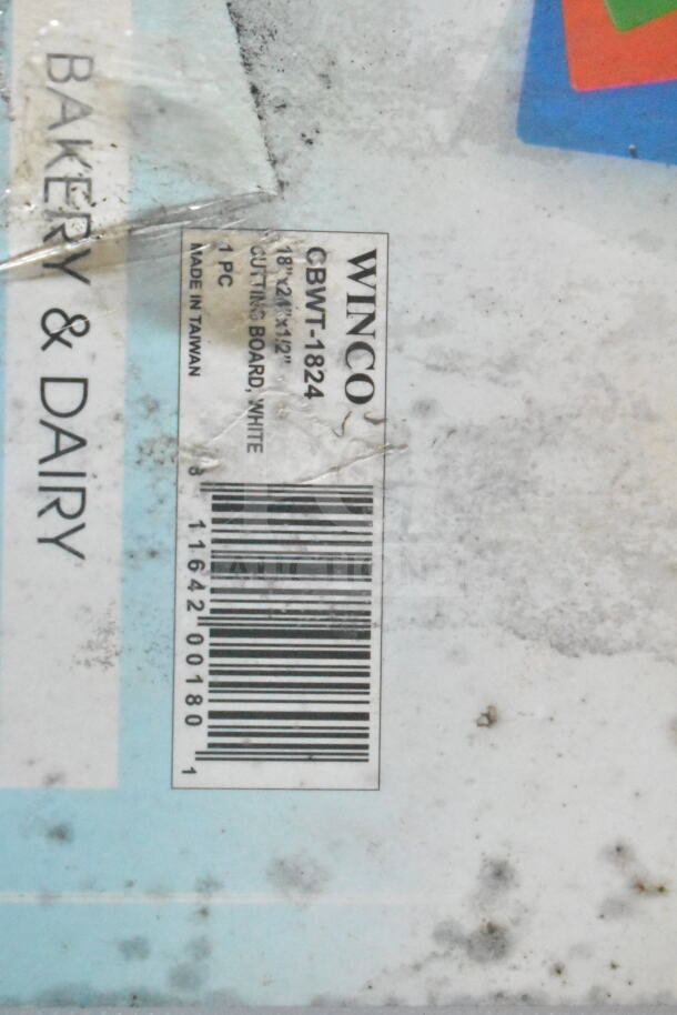 Label showing Winco cutting board, model CBWT-1824, 18"x12"x1/2", white, made in Taiwan, bar code visible.