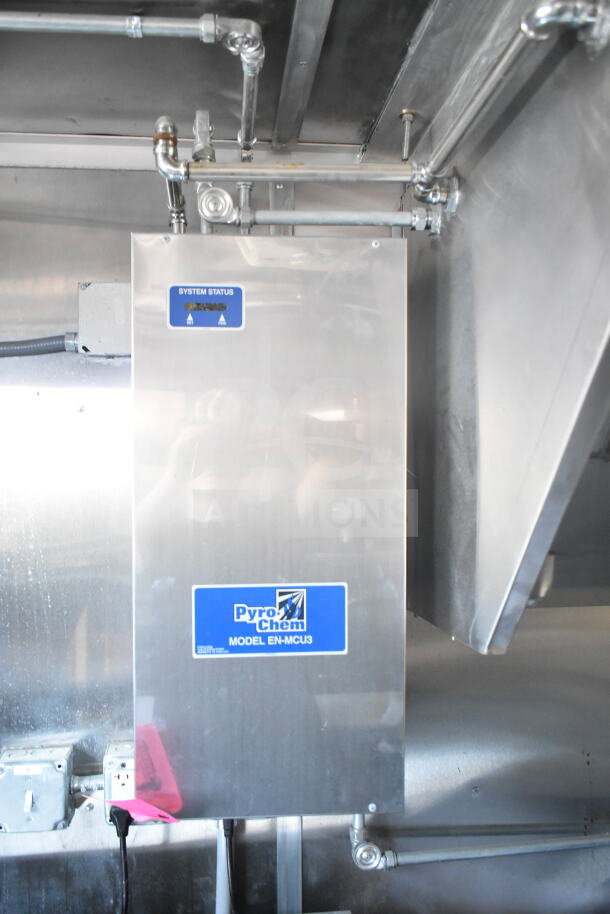 2021 Rock Solid Cargo food trailer interior showing Pyro-Chem model EN-MCU3 fire suppression system with labels.