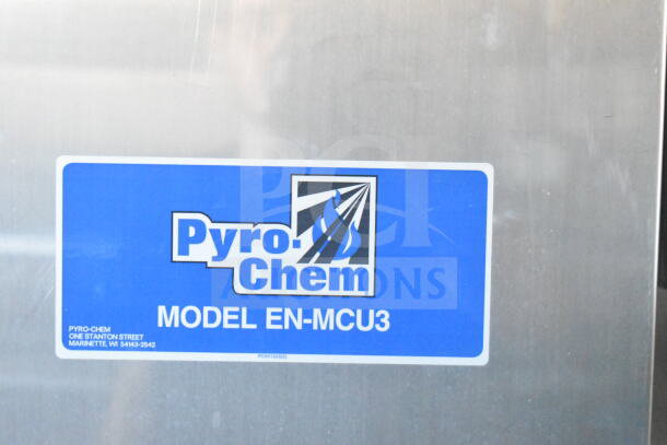 "Pyro-Chem Model EN-MCU3" label on a stainless steel surface. Manufacturer details included.