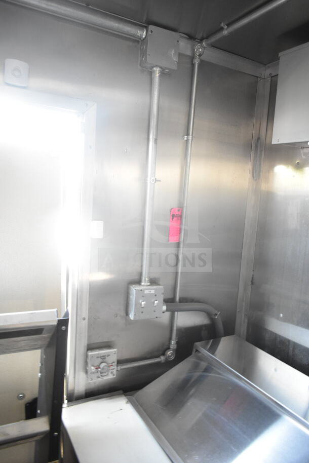 2021 Rock Solid Cargo 8.5'x24' food trailer interior showing electrical and fire suppression system controls.