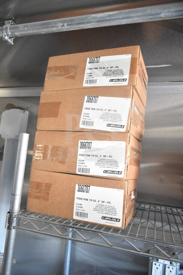Boxes labeled Carlisle food pans, size 1/9, 4" depth, on a wire shelf inside the Rock Solid Cargo food trailer.