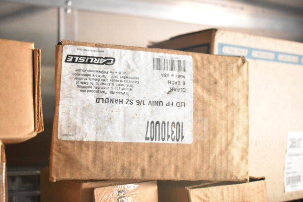 Cardboard box labeled "Carlisle" with product details in storage.