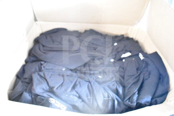 A box filled with black fabric items, folded and stacked.