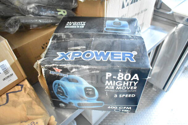 Box of XPOWER P-80A Mighty Air Mover featuring 600 CFM and three-speed settings, highlighted on packaging.