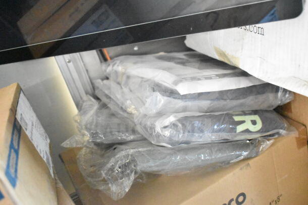 Rock Solid Cargo 8.5'x24' food trailer interior with packed boxes, highlighting storage and organizational space.