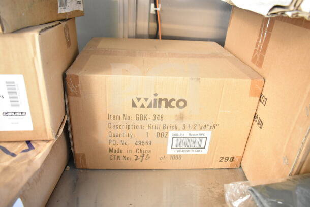 Cardboard box labeled "Winco" containing grill bricks, item GBK-348, size 3.5"x4"x8", quantity 1 dozen, made in China.