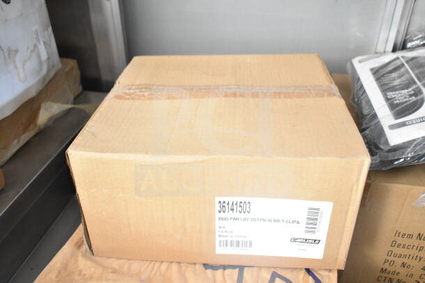Cardboard box labeled “Carlisle” with product code 36141503, indicating “DUO-PAN LBY DSTPN W/BR/Y-CLIP,” made in China.