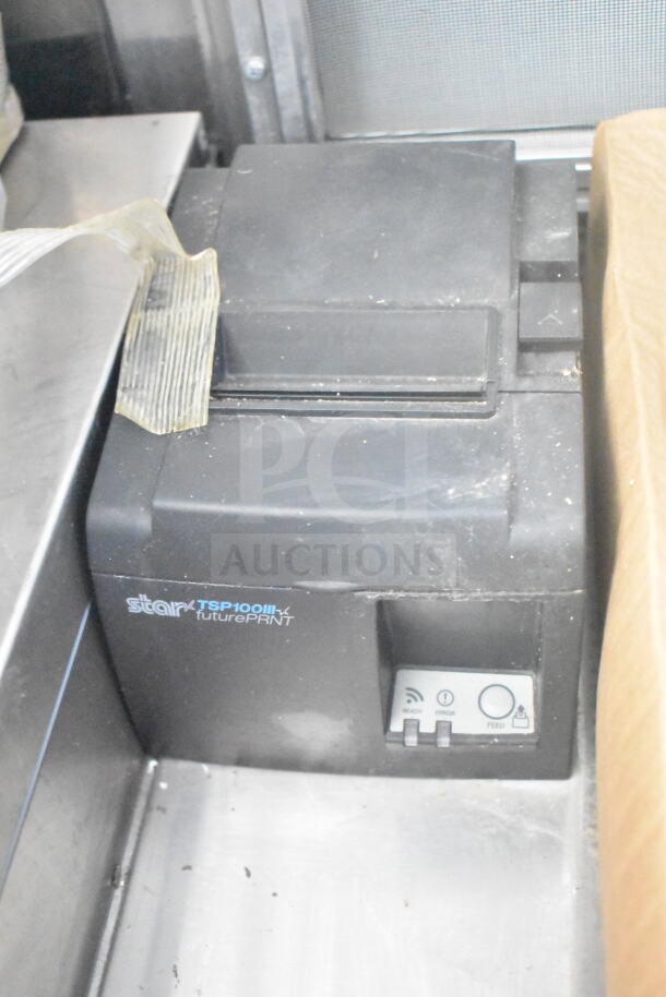 Star TSP100III futurePRNT thermal printer in a 2021 Rock Solid Cargo food trailer. Features visible are the control panel and branding.