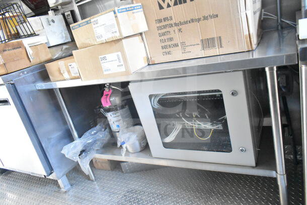 2021 Rock Solid Cargo 8.5'x24' food trailer interior, featuring CaptiveAire grease hood, Imperial gas fryers, and fire suppression.