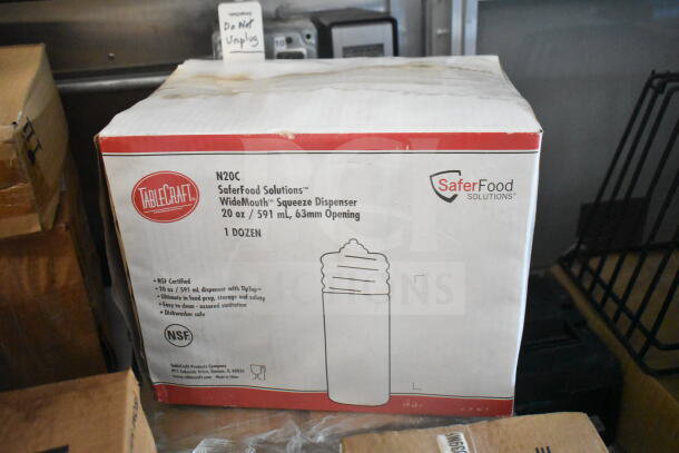 Cardboard box of TableCraft N20C SafeFood Solutions WideMouth Squeeze Dispensers, 20 oz, NSF Certified, 1 dozen.