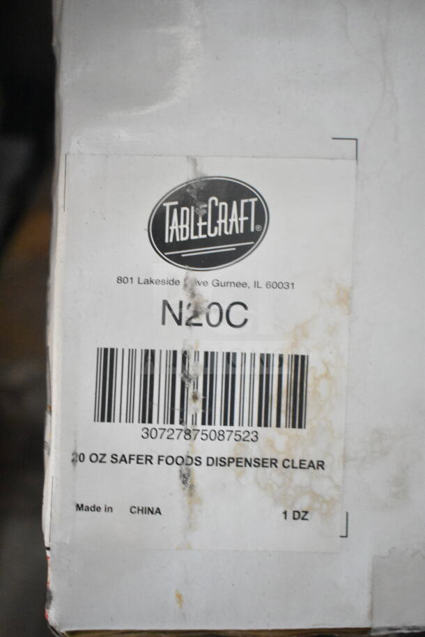 A worn label on a box shows "TableCraft N20C," barcode, and indicates a 20 oz safer foods dispenser, made in China.