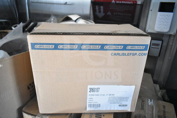 Cardboard box labeled "Carlisle" containing food pans, size 1/3, depth 4", 8 pieces. Made in China.