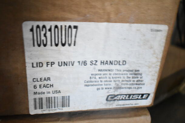 A cardboard box with a Carlisle label showing item number 10310U07. Label reads "Lid FP Univ 1/6 Sz Handld", six clear lids per box, made in USA. Warning about BPA exposure.