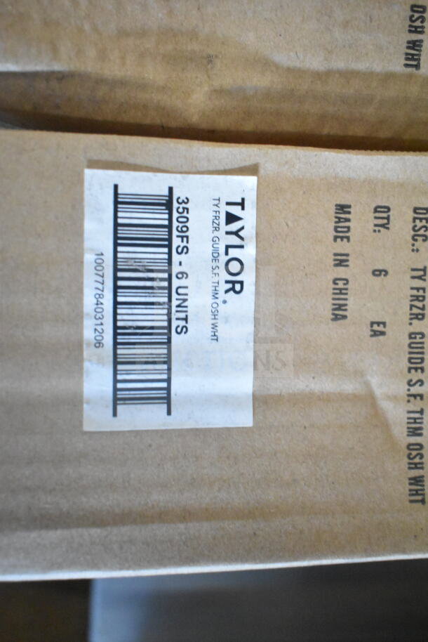 Barcode label "Taylor" on cardboard box. Text reads "TY FRZR GUIDE S.F. THN OSH WHT, QTY: 6, MADE IN CHINA."