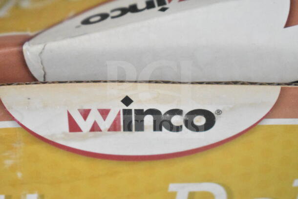 Close-up of a Winco box label, featuring the brand name in black and red on a yellow background.