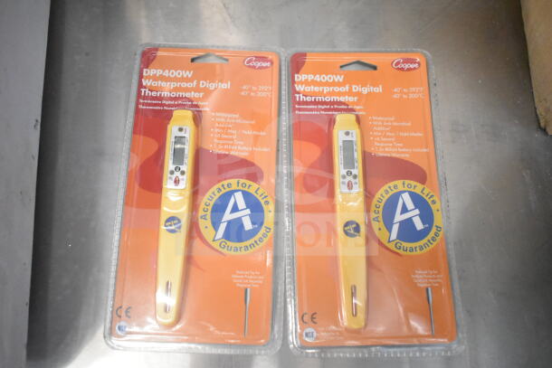 Two Cooper DPP400W Waterproof Digital Thermometers in packaging; features include fast response time and antimicrobial additive.