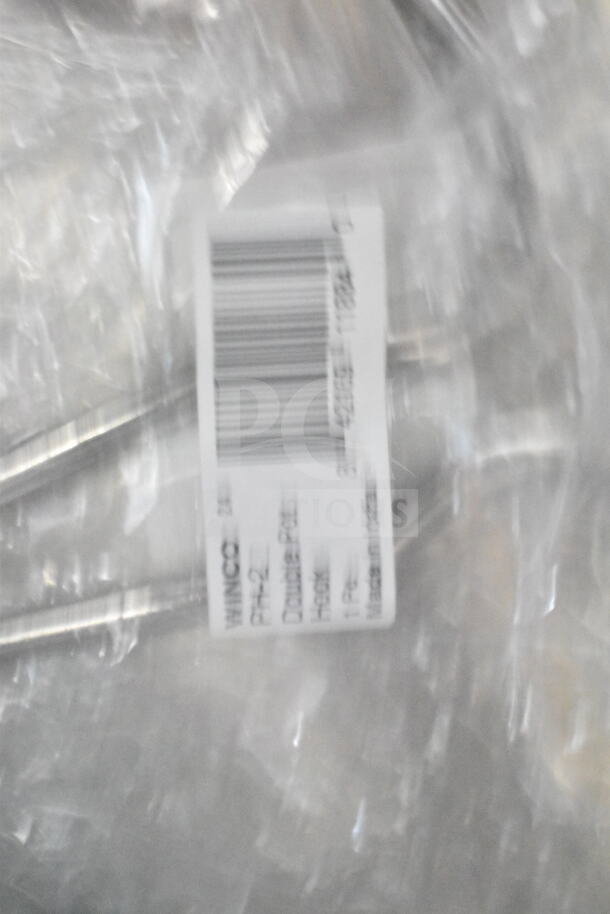 Barcoded label on plastic wrap, showing text "WINCO 24 PH-2 Double Fork Hook, 1 Pc, Made in India."