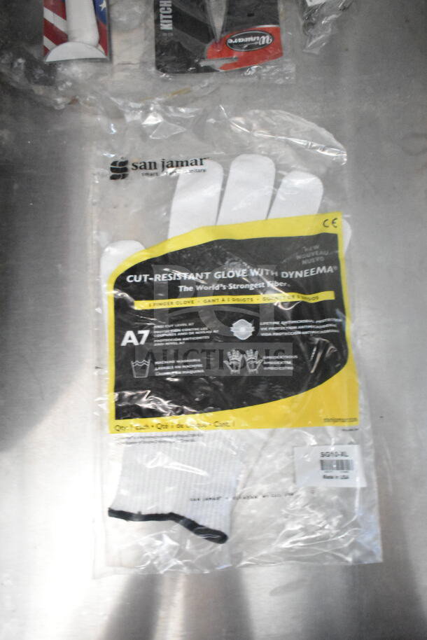 San Jamar cut-resistant glove with Dyneema in packaging. Features include level A7 cut resistance, machine washable, size XXL.