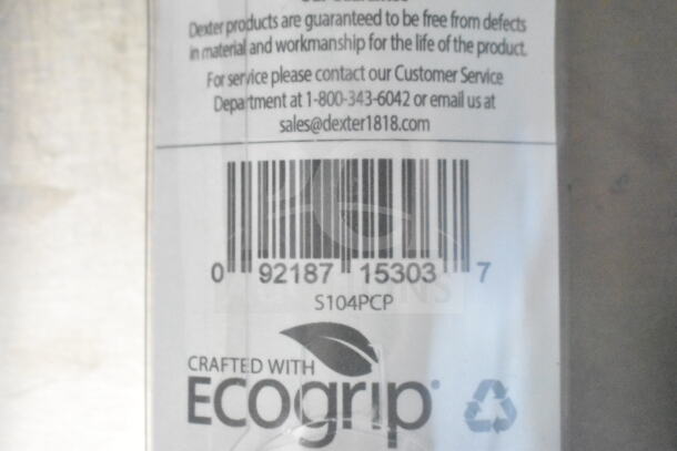 Barcode and label with text about Dexter product warranty, contact information, and "Crafted with Ecogrip" branding.