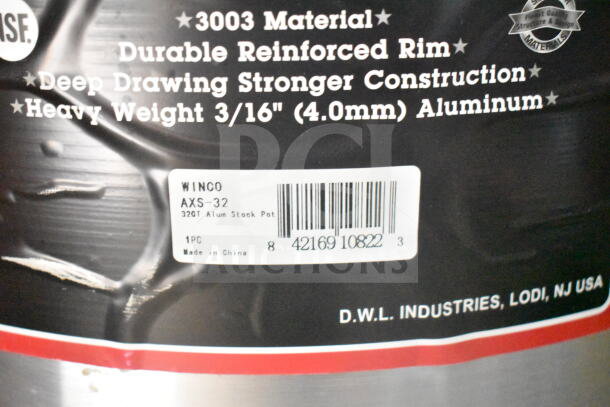 Alt text: "Winco AXS-32, 32QT aluminum stock pot label showing material details and barcode."