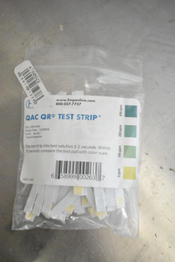 QAC QR Test Strips pack with instructions and barcode, expiring 12/2023, containing 100 strips for solution testing.