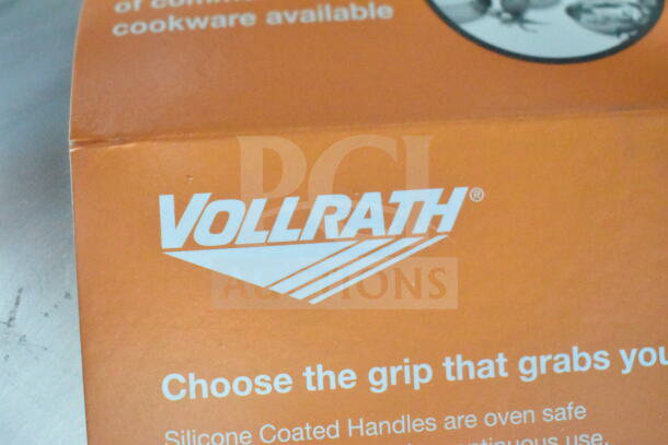 Vollrath box with branding text "Choose the grip that grabs you." Features silicone coated handles.