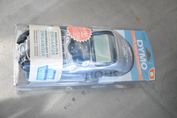 Dymo Label Maker in packaging. Features personalize and organize options. Includes labels. Brand logo visible.