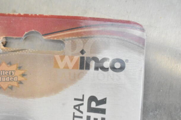 Packaging of a kitchen tool by Winco, with only partial text visible.
