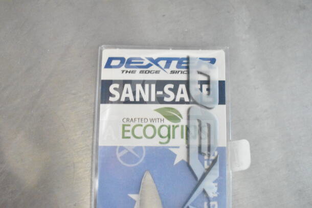 Dexter Sani-Safe tag, with "Crafted with EcoGrip" label indicating eco-friendly materials.