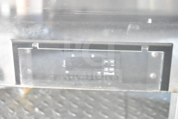 Close-up of temperature control panel on a 2021 Rock Solid Cargo food trailer. The panel displays various settings.
