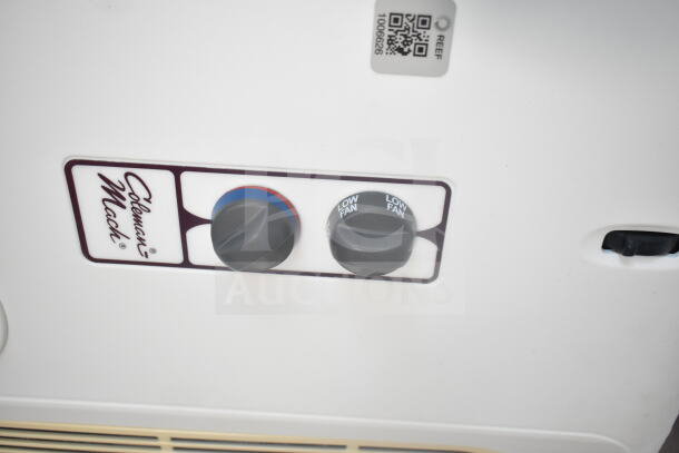 Coleman Mach temperature and fan control panel with dual knobs, labeled low fan. Includes REEF QR code sticker.