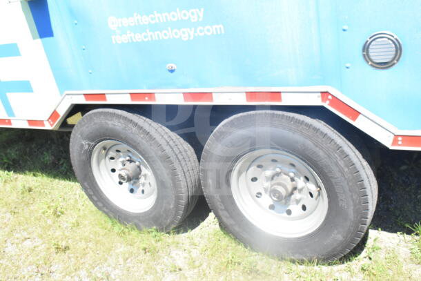 2021 Rock Solid Cargo 8.5'x24' food trailer with dual tires, visible branding text, and part of the exterior shown.