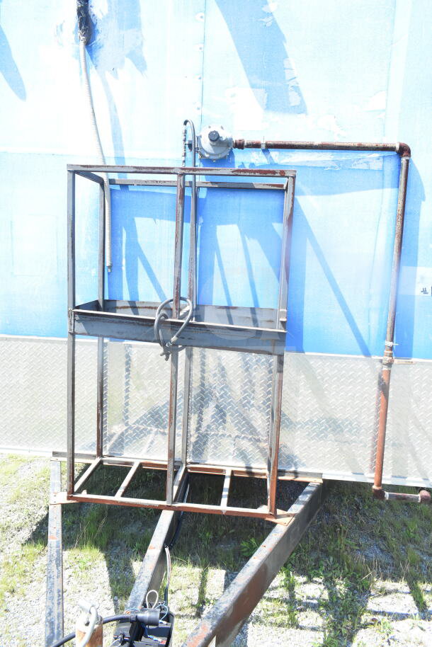 2021 Rock Solid Cargo 8.5'x24' food trailer chassis, featuring a metal frame, in stable condition.