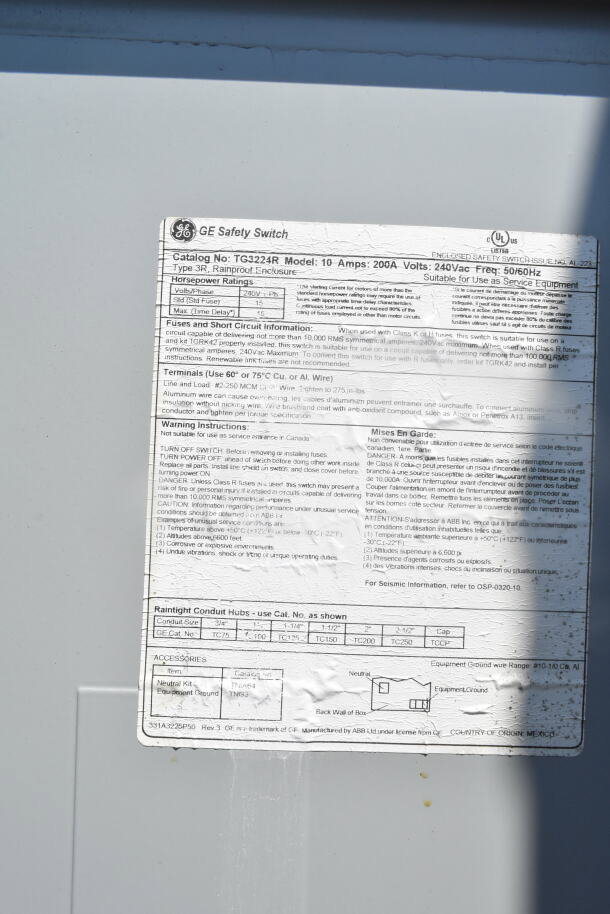 GE safety switch label on 2021 Rock Solid Cargo food trailer. Details model TG3224R, 200A, 240V, with installation instructions.