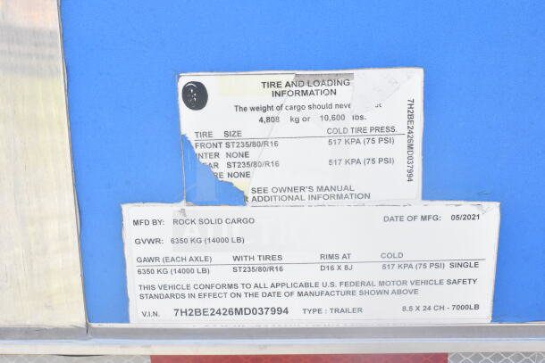 Label on 2021 Rock Solid Cargo 8.5'x24' food trailer. Shows GVWR: 6350 KG, tire info, and VIN: 7H2BE2426MD037994.